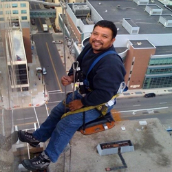 Columbus Window Cleaner at Globe Window Cleaning on high rise building